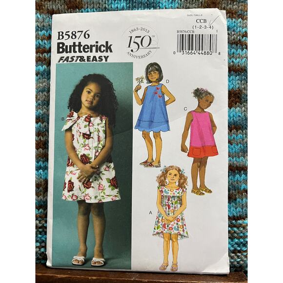 Butterick Sewing pattern 5876 toddler girls Aline dress size 1 2 3 4 - Picture 1 of 8